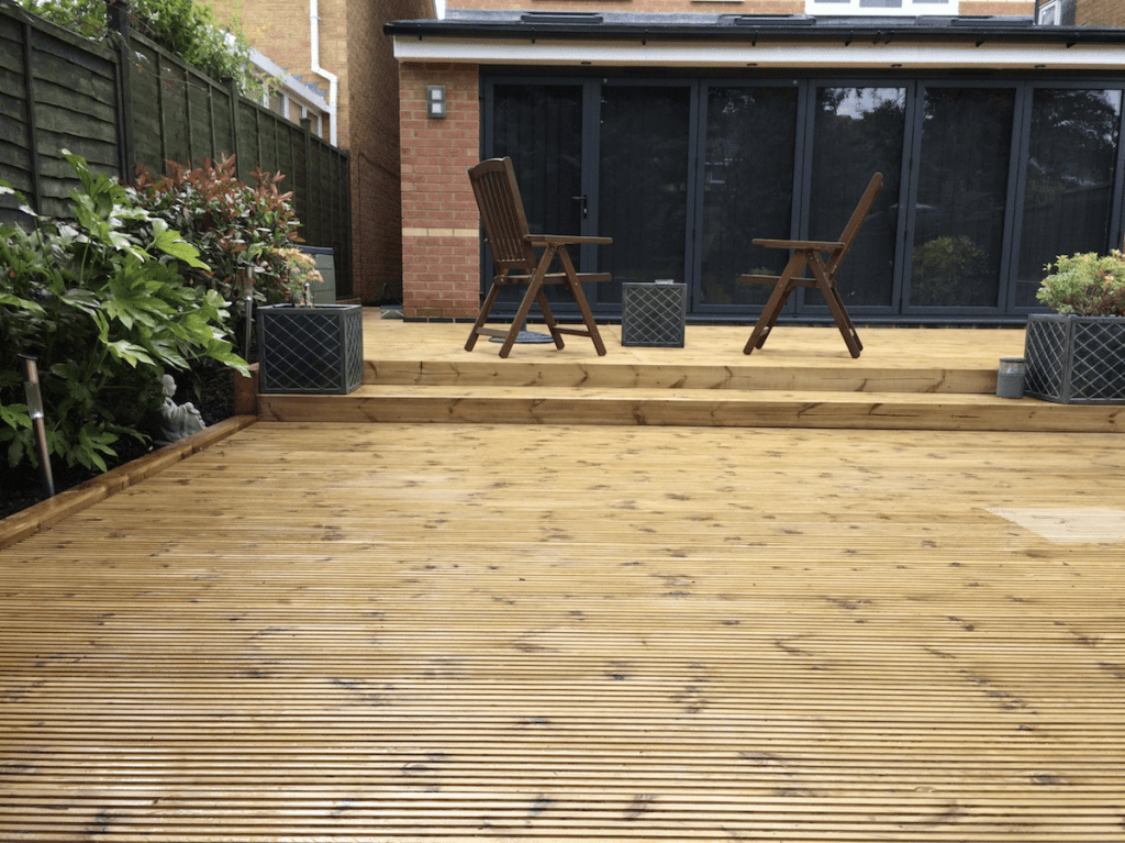 garden decking installers Sheffield light oak wood deck with stepped raised area