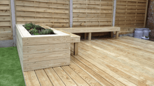 garden decking installers sheffield hardwood decking with seated bench and planters